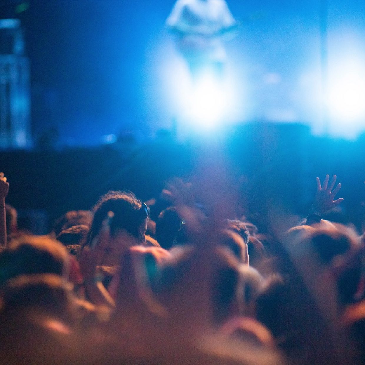 crowd partying stage lights live concert summer music festival